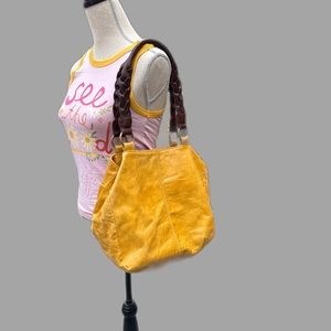 Yellow leather purse by Lucky Penny.